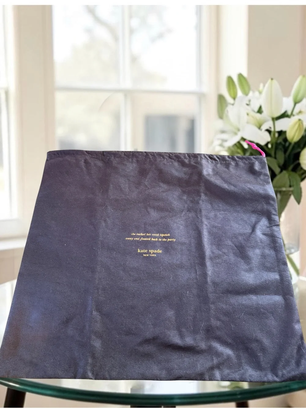 Kate Spade New York brown textured story book bust bag with gold writing 17x19